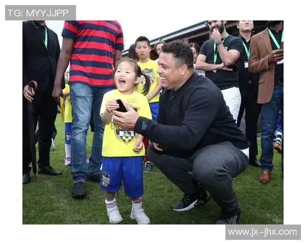 足球明星与球迷亲密合影展现热情瞬间共同追逐梦想的美好时刻